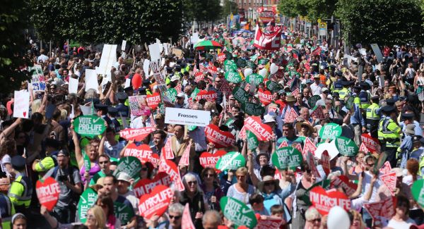 Gardai seperate Pro Life and Pro Choice protestors on O'Connell Street. Picture: Niall Carson, PA