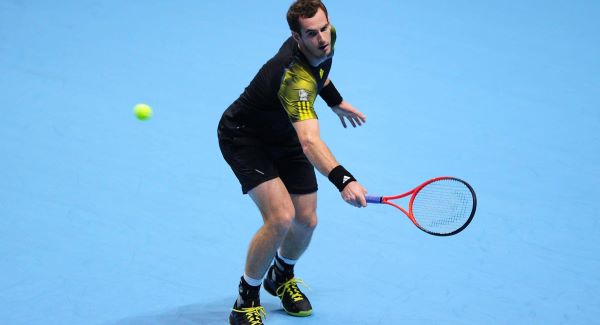 Andy Murray in action against Switzerland's Roger Federer during the Barclays ATP World Tour Finals at the O2 Arena, London