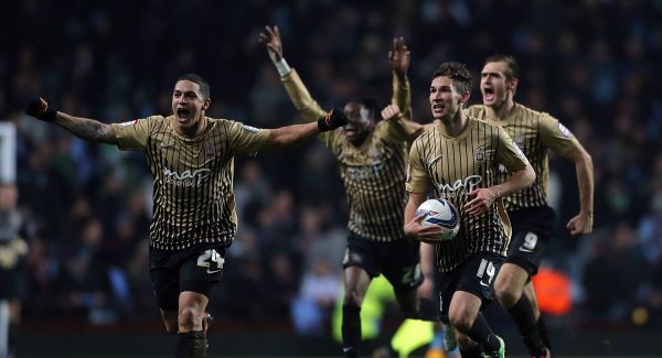 Bradford City's Nathan Doyle, Will Atkinson and James Hanson celebrate after the game last night.Picture: PA