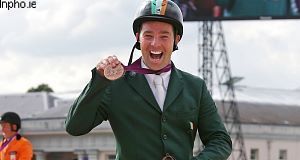 Cian O'Connor with bronze medal