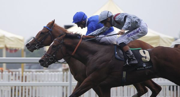 'Dawn Approach ridden by Kevin Manning (left) before winning the St James's Palace Stakes ahead of Toronado ridden by Richard Hughes (right). Picture: PA