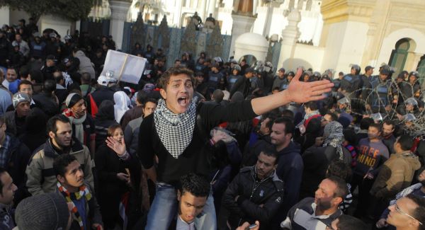 Egyptians shout slogans during anti-President Mohammed Morsi protest in front of the presidential palace in Cairo.Picture: AP