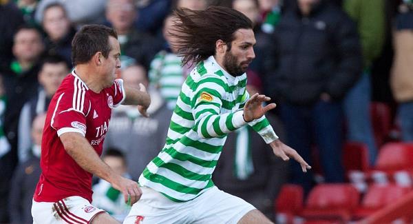 Aberdeen's Gavin Rae battles for the ball with Celtic's Georgios Samaras today. Picture: PA