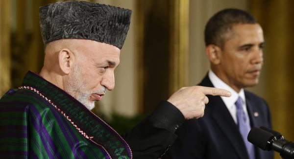Afghan President Hamid Karzai takes questions from reporters during his joint news conference with President Barack Obama in the East Room at the White House in Washington today.Picture: AP