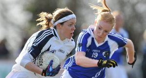 Michelle Carey, Kildare, in action against Patricia Fogarty, Laois. Picture: SPORTSFILE