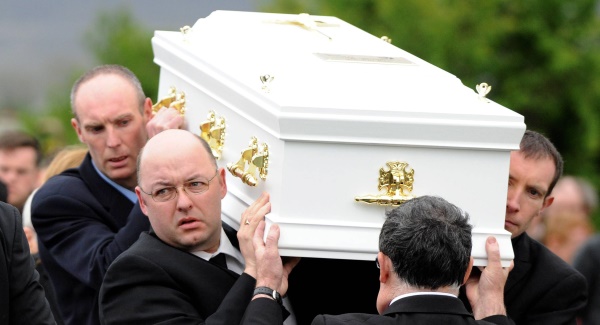 Tony Heffernan carries the remains of his son Liam to his final resting place. Picture: Don MacMonagle