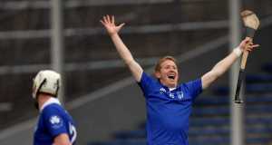 Thurles Sarsfields' Ger O'Grady celebrates a score in the final moments of the match. INPHO