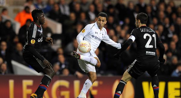 Tottenham Hotspur's Aaron Lennon battles for the ball with Lyon's Samuel Umtiti (left) and Maxime Gonalons (right).Picture: PA