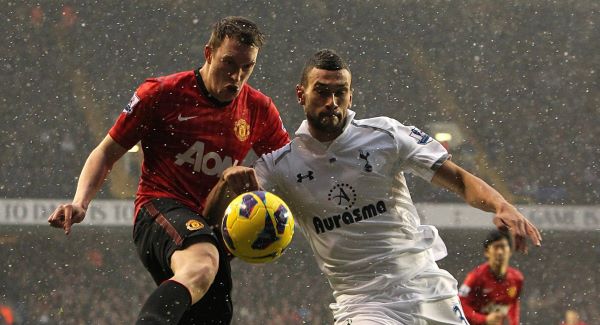 Manchester United's Phil Jones (left) and Tottenham Hotspur's Steven Caulker (right) battle for the ball.Picture: PA
