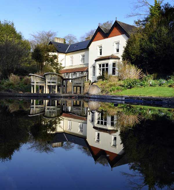 Strawberry Hill. Gothic detailing. THE COTTAGES. 1-3 Cork Road. Glanmire. (1820). Thought to dating back to the 1830s, which had been renovated in 1911 JC680 NIAH_Cork Book(AW)(3):Cork City - Buildings of Ireland